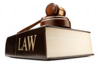 book of law with judge's gavel 